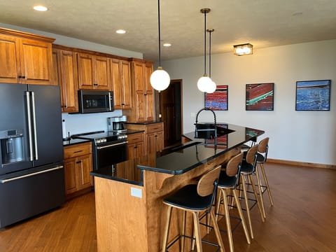 Enjoy all the amenities of home - New GE Cafe appliances & fully stocked kitchen