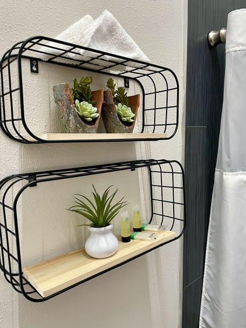 Shower, rainfall showerhead, towels, soap