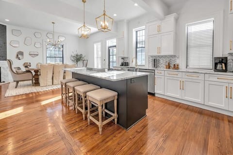 Cook in style in our newly updated kitchen, featuring modern appliances and plenty of counter space.