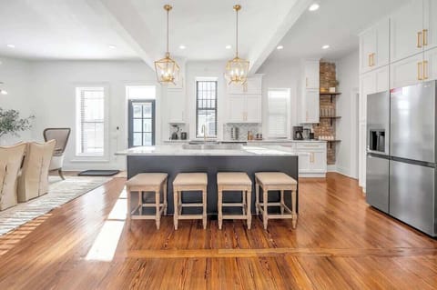 Unleash your inner chef in this stunning kitchen, equipped with premium gas appliances, refined details, and thoughtfully designed spaces perfect for preparing everything from casual breakfasts to gourmet dinners.