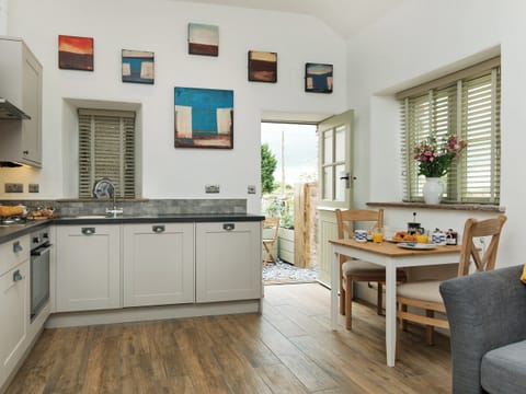 Thoughtfully renovated open plan living space | Blakeskerra Barn, Kenfig, near Porthcawl