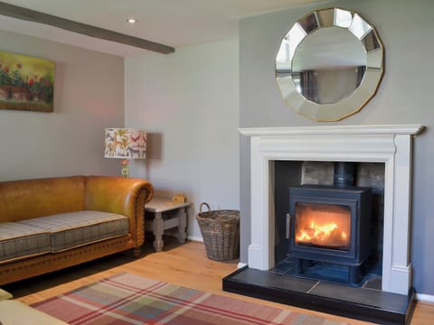 Cosy and warm living room with wood burner | Lowther Cottage, Lowther, near Penrith