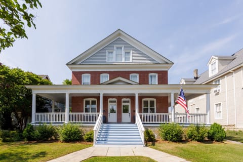 Guests can enjoy the large wrap around porch and its lounge furniture.