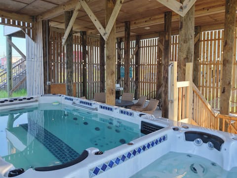 Cast Away Under House with swim spa and outdoor living area