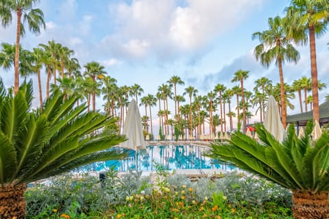 Indoor pool, seasonal outdoor pool, pool umbrellas, sun loungers