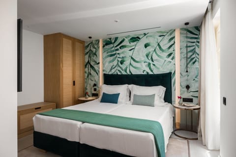 Presidential Suite | Premium bedding, down comforters, individually decorated