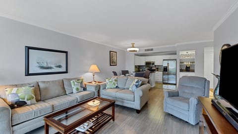 Bright and comfortable living room space with sleeper sofa