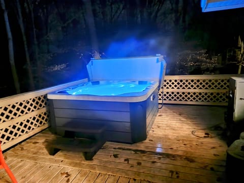 This tub has color changing LED lighting , Bluetooth radio,  1 lay down, seats 5
