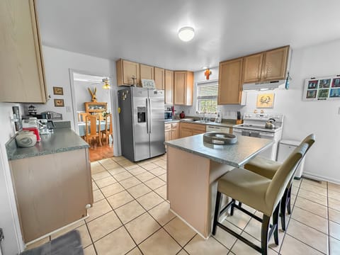 Kitchen with island seating for 2