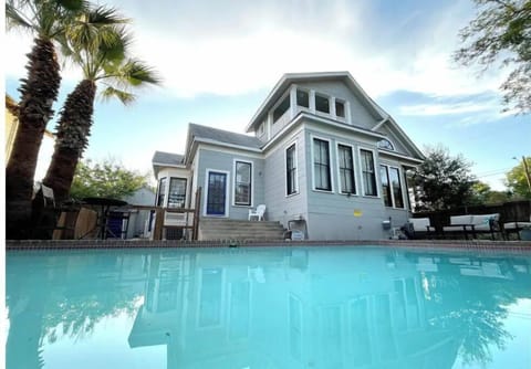 Looking from behind the pool at Woodlawn Manor, upgraded 1915 Craftsman.