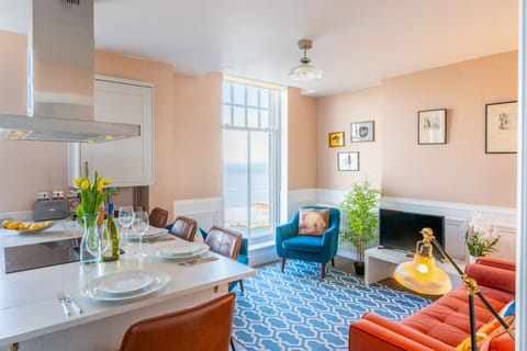 With a peninsular island and sitting room beyond