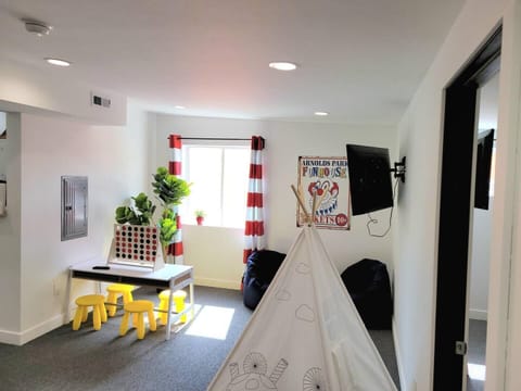 The kids' area offers a designated space for younger guests to play and unwind, keeping them entertained throughout their stay.