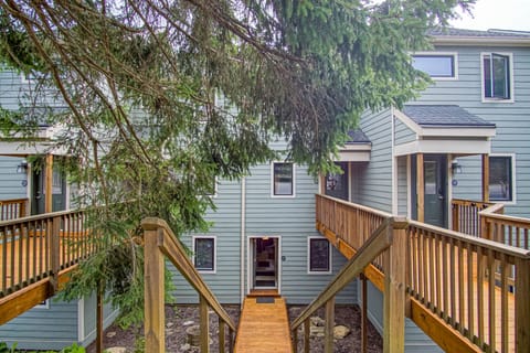 Steps lead down for the parking lot to the entrance