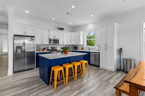 Kitchen includes all dishes you could need to celebrate your time at the beach.