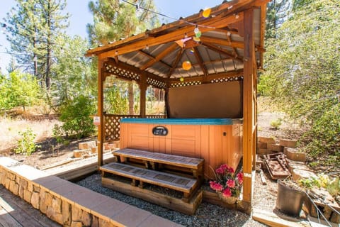 Hot tub easily accessible from the backyard deck