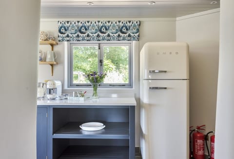 Hilltop Cottage, Wimborne: A wonderful view from every window, even when making a coffee using the Smeg pod machine