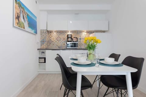 Kitchenette with dining table. 