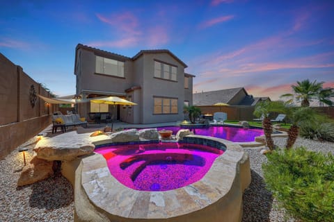 Heated spa spills over to pool, perfect for winter nights.