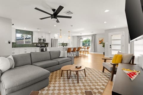 Kick back in the open-concept living area, perfect for hanging out after a day in the sun.