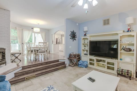View of dining area and living area.