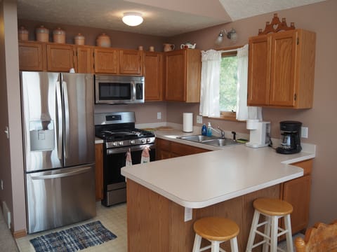 KTICHEN: There is a modern and convenient kitchen with appliances except for a dishwasher.
