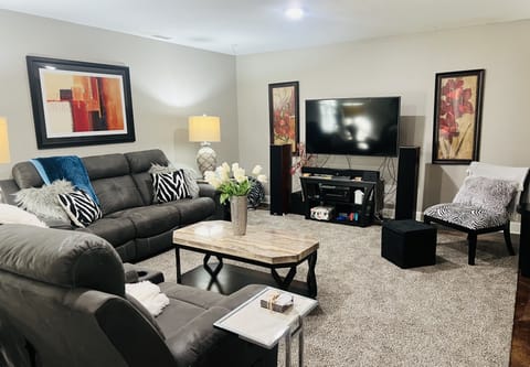 Living room, Nintendo switch, large tv, Netflix, Disney plus 