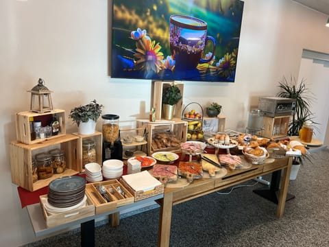 Daily buffet breakfast (CHF 15 per person)