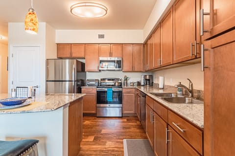 Deluxe Apartment | Private kitchen | Dining tables