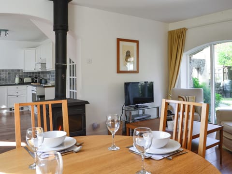 Open plan living space with wood burner | Goose Cottage, Drumcrosshall, Bathgate near Edinburgh