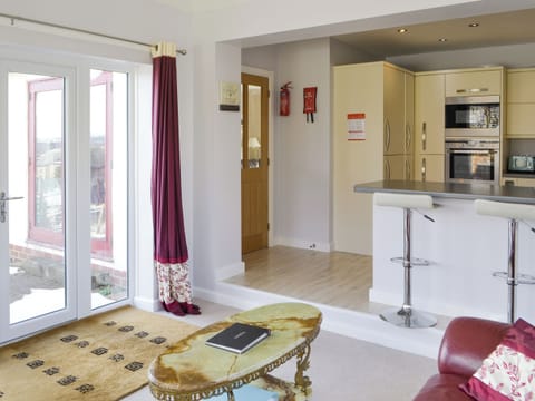 Open aspect from sunroom to kitchen | Heatherlea, Otterburn