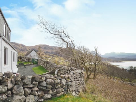 Stunning views across the bay and the awe inspiring Torridon hills beyond | Croft Cottage, Gairloch, Wester Ross
