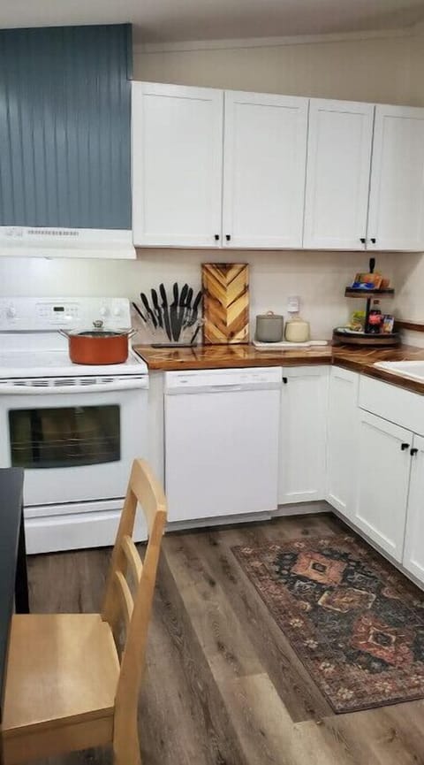 Kitchen supplied fully with all cooking utinceles and pans.