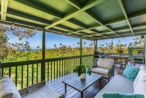 Sit back and relax on the spacious covered lanai, the perfect spot to sip your morning coffee while soaking in tropical breezes and lush views.