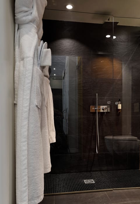 Designer toiletries, hair dryer, towels, soap