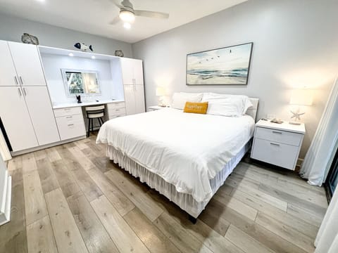 The master bedroom has a king mattress and direct access to the deck and in suite bathroom.