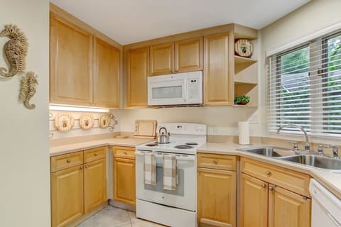 You can get a glimpse of the pool out the kitchen window ;-)