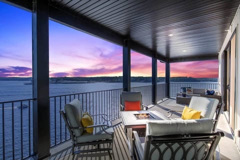 The view at sunset from our Penthouse corner unit is spectacular! Nearly 50' above the water provides unmatched tranquility. Enjoy a relaxing book with your favorite drink or warm yourself with the fire pit in the evenings with your closest friends.