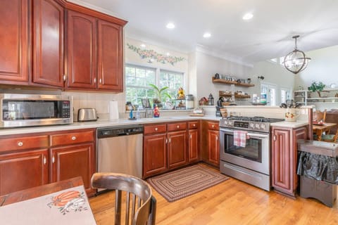 The nicely designed and fully equipped kitchen will have your inner foodie smiling!