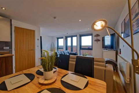 Comfort Apartment | Living area | 75-inch Smart TV with cable channels, TV