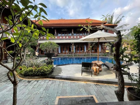 Outdoor pool, open 7:00 AM to 6:00 PM, pool umbrellas, sun loungers