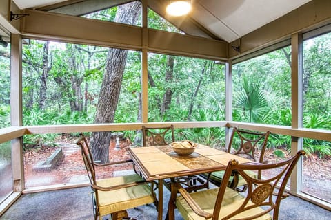 comfortable screened porch overlooking the private wooded view