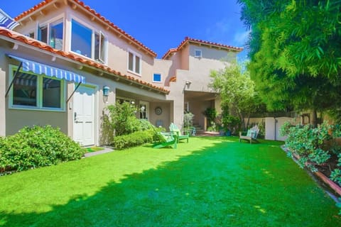 grassy area in front of cottage