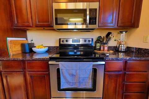 stove, microwave, blender, toaster and cooking spices.