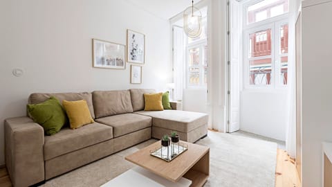 Bright living area with a TV