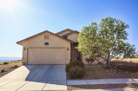 Front of property with 2 car garage. No house on either side of you or behind