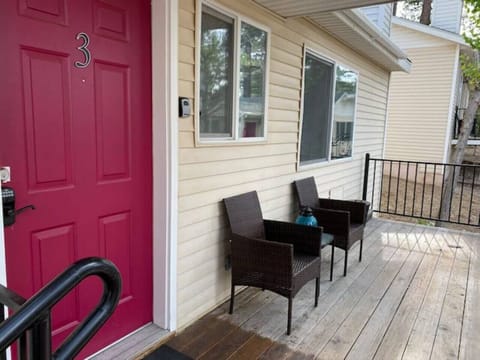 Sit and relax while feeling the fresh air on the porch.