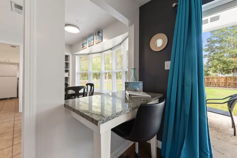 Designated Desk Space - This designated desk space, helps your relax with a bright open window to look outside and enjoy the sunshine from within.