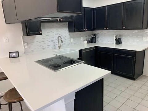 Stylish kitchen offers a perfect blend of functionality and modern design.