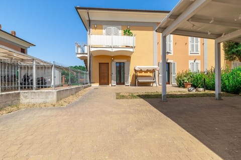 Plant, Sky, Land Lot, Building, Shade, Residential Area, Urban Design, Neighbourhood, Public Space, Facade