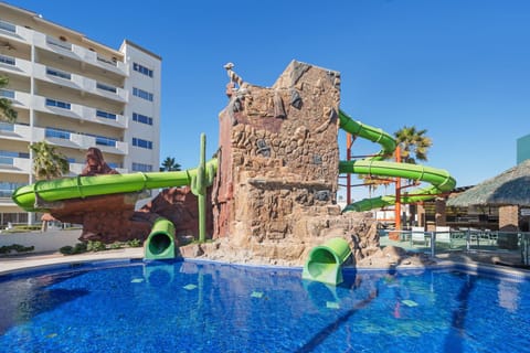 Resort-style pool with thrilling dual water slides fun for the whole family!